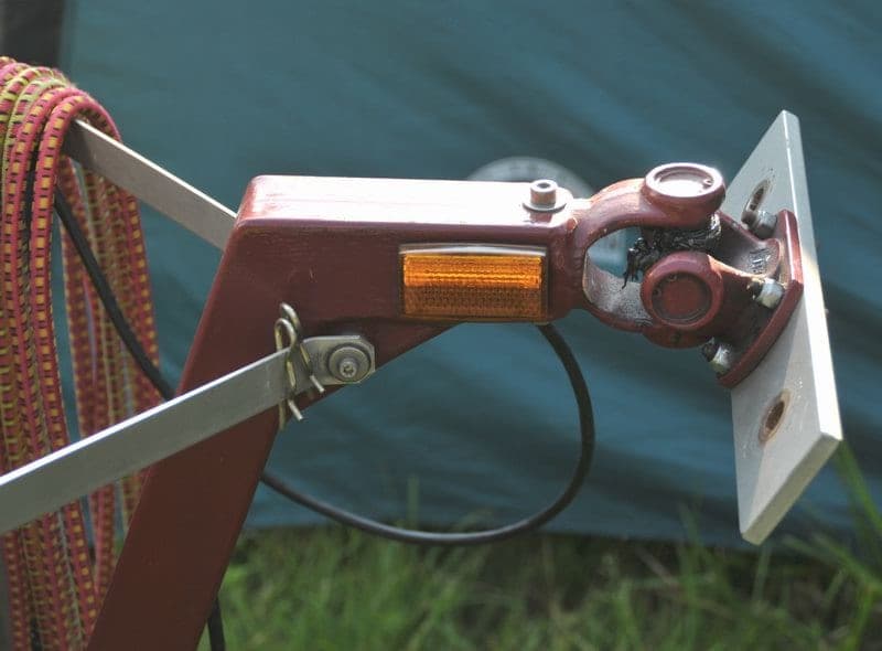 The coupler, safety chain and jack on a small trailer tongue